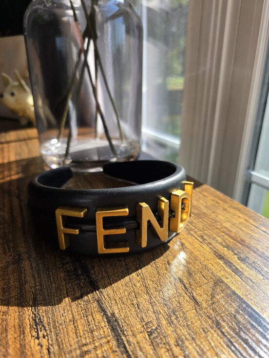 The Unbranded Brand Accessories - Fashion Black Faux Leather Headband with Gold Lettering